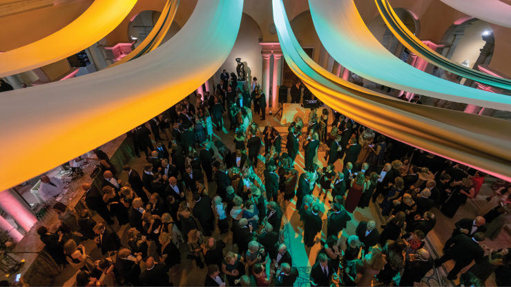 overhead view of gala attendees gathered on the sculpture court