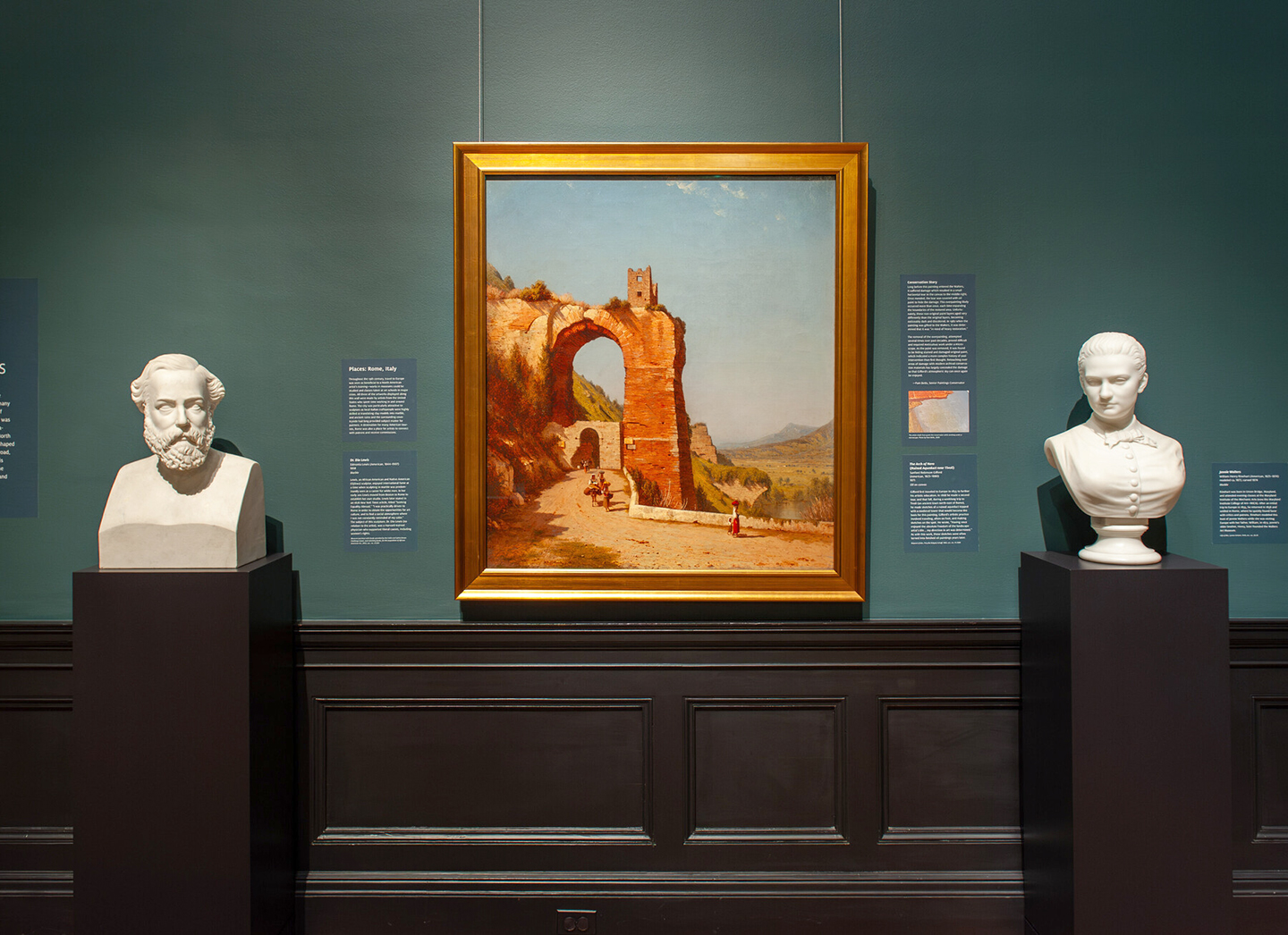 In-gallery view of Selections from the North American Collection: People and Places, which shows two sculptures flanking a painting.