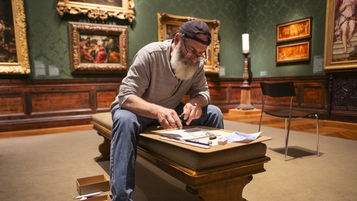 a museum visitor enjoying a free drawing class at the Walters in Baltimore