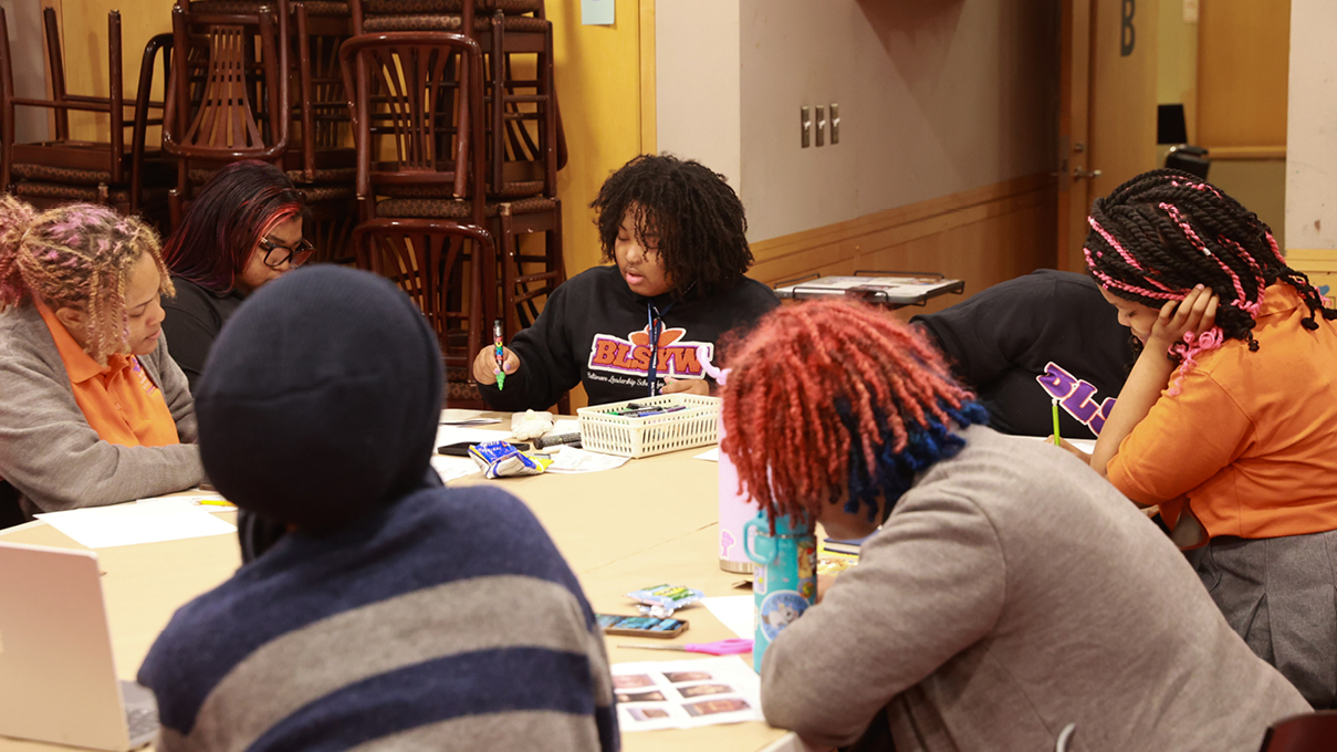 Teens collaborating together at the museum