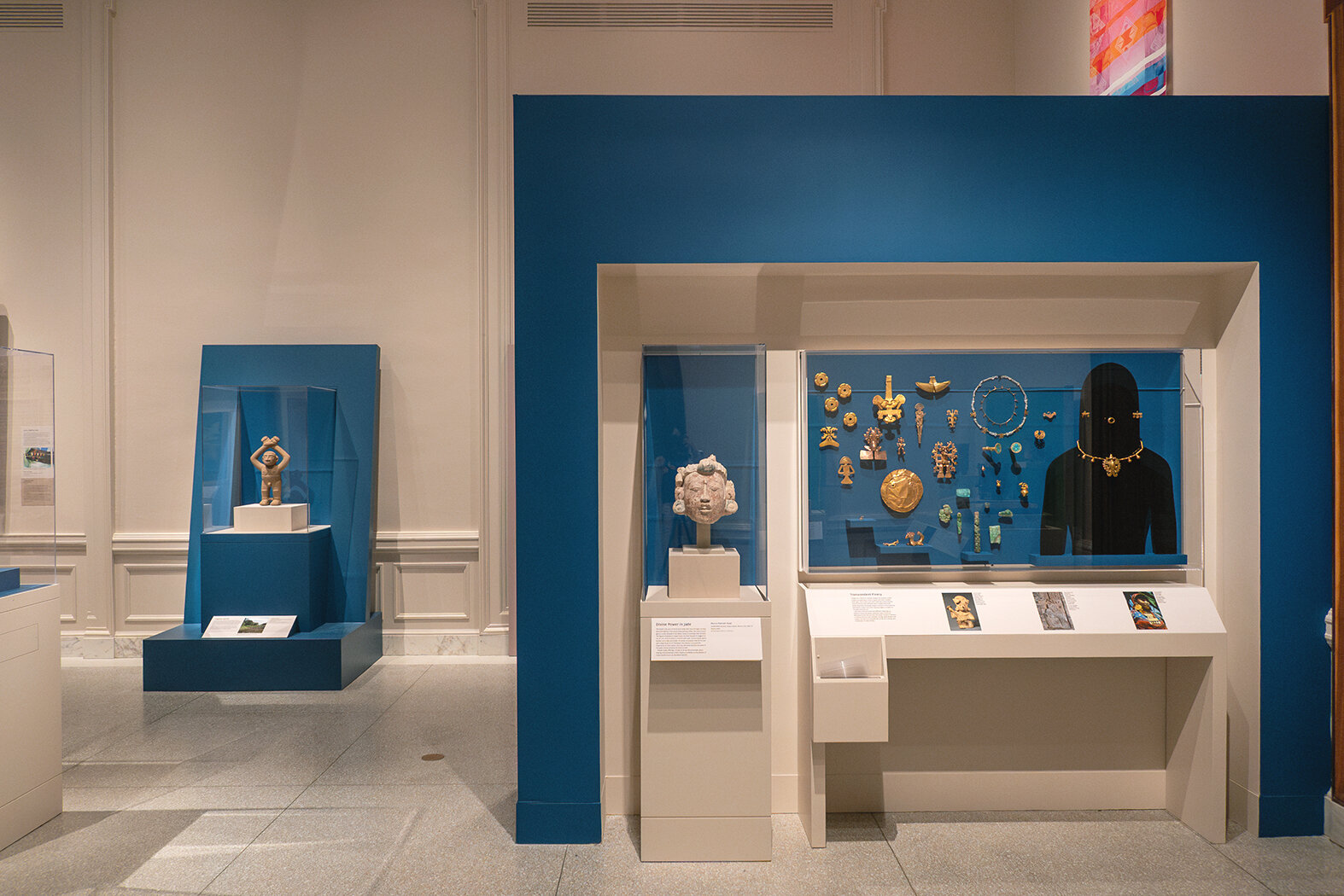 A display of adornment objects, many of them golden