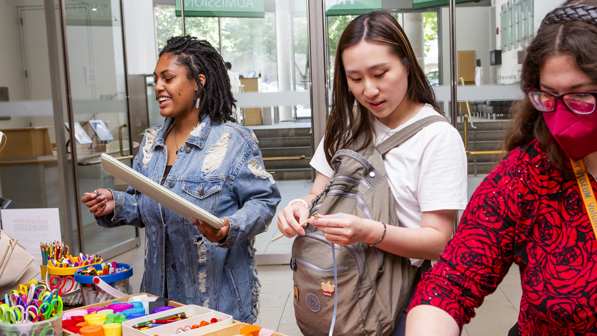 Museum visitors make art together