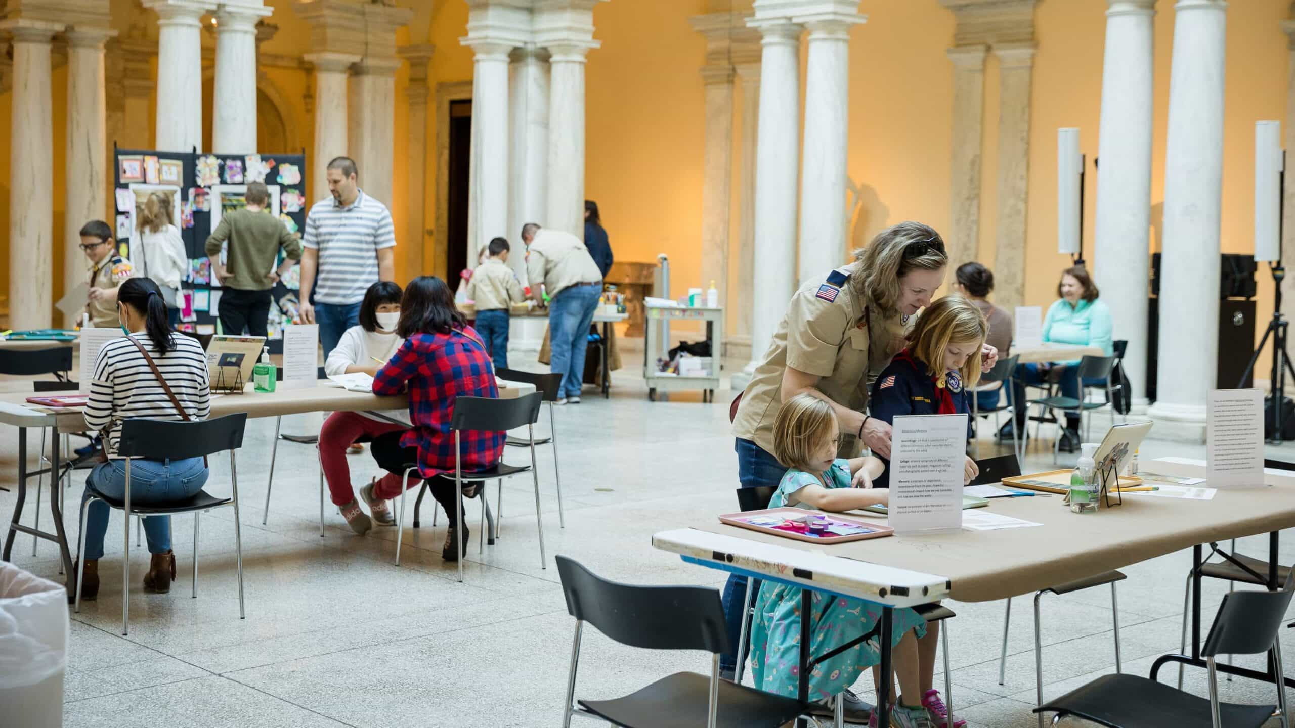 museum visitors enjoy an art activity