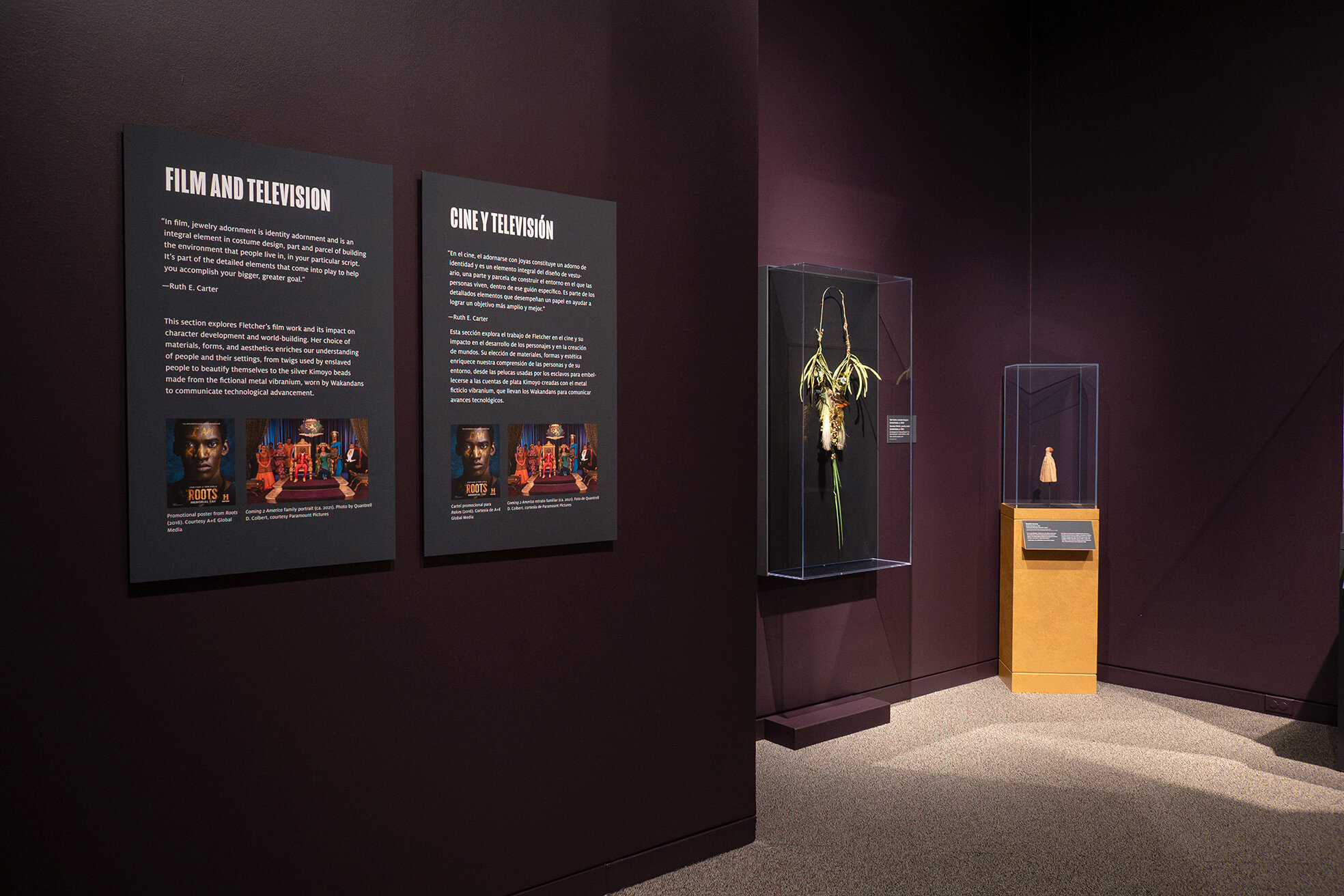Text panels and cases with jewelry iin the exhibition Douriean Fletcher: Jewelry of the Afrofuture