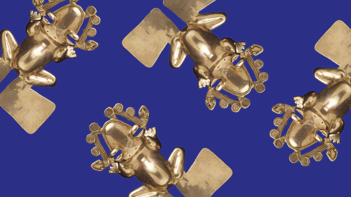 golden frogs against a blue background