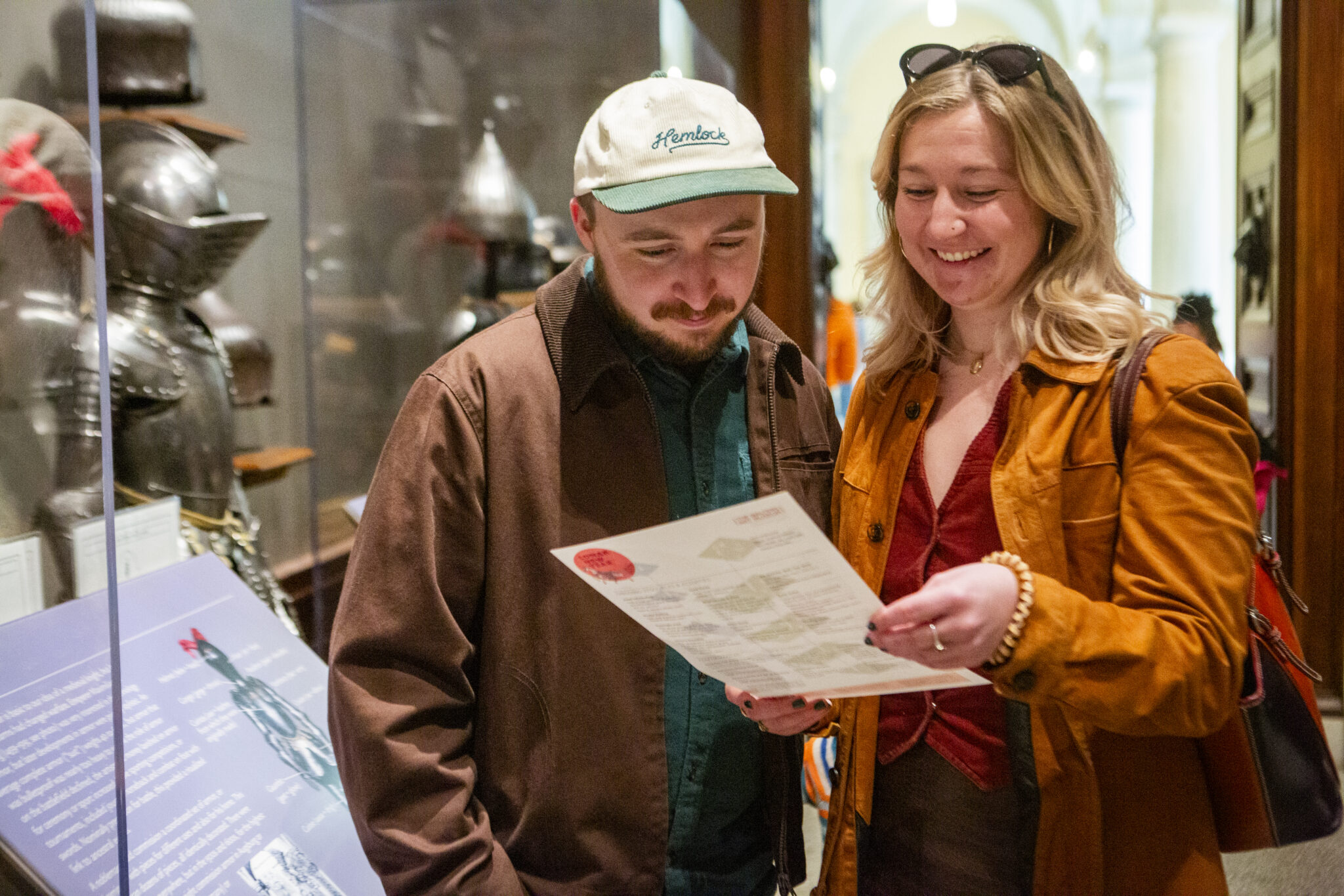 Visitors look at a schedule during a special event