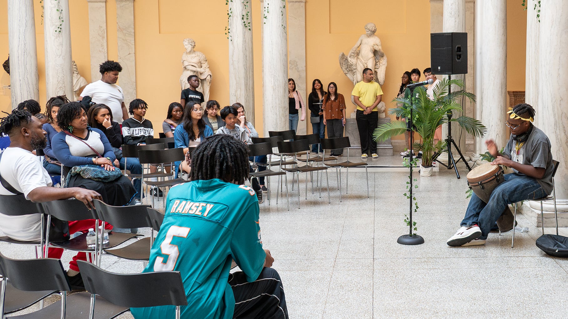 A group of teens in the Sculpture Court
