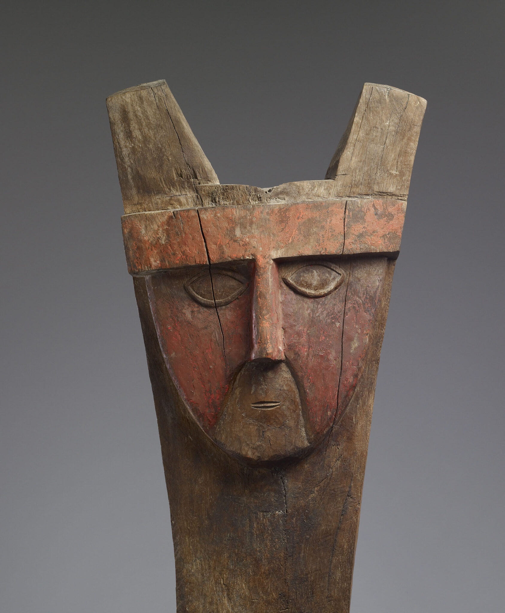 Post with Carved Faces